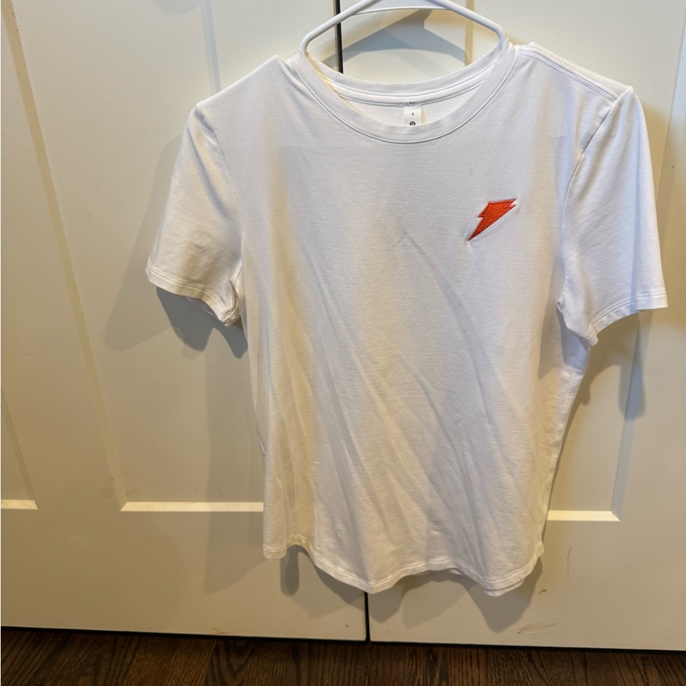 Lululemon White T-Shirt with Orange Lightning Bolt